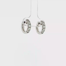 Load and play video in Gallery viewer, Royal Collection 14K White Gold 0.87 CTW Diamond Huggie Earrings
