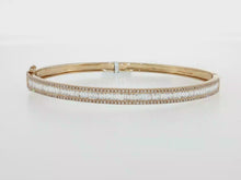 Load and play video in Gallery viewer, Royal Collection Baguette and Round Brilliant Cut Diamond Triple Row Bangle in Yellow Gold
