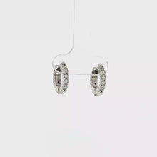 Load and play video in Gallery viewer, Royal Collection 14K White Gold 0.51 CTW Diamond Huggie Earrings
