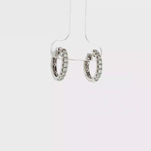 Load and play video in Gallery viewer, Royal Collection 14K White Gold Oval Diamond Huggie Earrings
