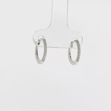 Load and play video in Gallery viewer, Royal Collection 14K White Gold 0.08 CTW Thin Diamond Huggie Earrings
