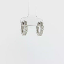 Load and play video in Gallery viewer, Royal Collection 14K White Gold 1.04 CTW Diamond Huggie Earrings
