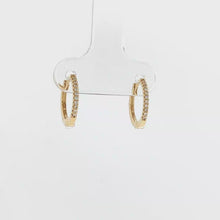Load and play video in Gallery viewer, Royal Collection 14K Yellow Gold 0.07 CTW Diamond Thin Huggie Earrings
