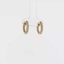 Load and play video in Gallery viewer, Royal Collection 14K Yellow Gold Inside-Out Diamond Huggie Earrings
