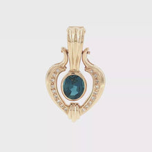 Load and play video in Gallery viewer, Royal Estate 14K Yellow Gold 3.60 CT Blue Topaz &amp; 0.30 CT Diamond Enhancer Pendant
