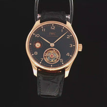 Load and play video in Gallery viewer, IWC Portuguese Hand Wound Tourbillon Day and Night (Model: IW545901)

