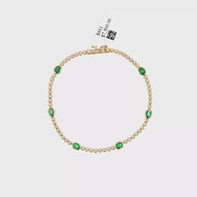 Load and play video in Gallery viewer, Royal Collection Oval Emerald and Round Diamond Bezel-Set Tennis Bracelet in Yellow Gold
