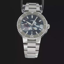 Load and play video in Gallery viewer, Oris Aquis Date "Upcycle" (Model: 733 7766 4150)
